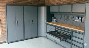 An L-shaped modular garage cabinet system layout designed to maximise storage in a corner space.