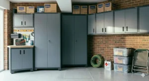 Eye-level wall-mounted garage units providing extra storage space above a clear floor area in a narrow single garage.