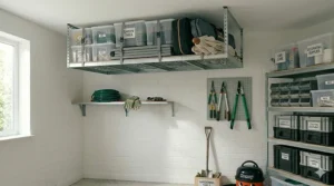 Fitted storage cabinets in a small garage, keeping tools and hardware neatly out of sight and organised.