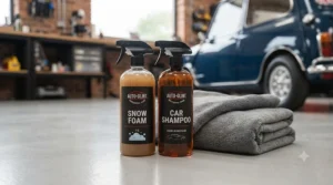 High-foaming car shampoo and snow foam applicator bottle from a complete car detailing kit for safe paintwork washing.
