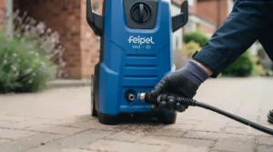 Hands connecting the high-pressure hose to a budget-friendly car washer during quick assembly.